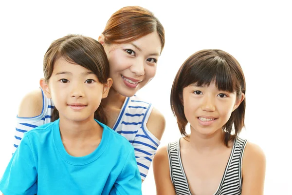 Sonriendo a los niños con madre — Foto de Stock