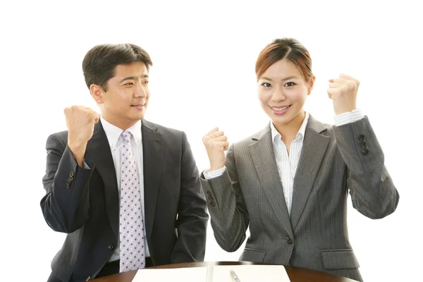 Smiling businessman and businesswoman — Stock Photo, Image