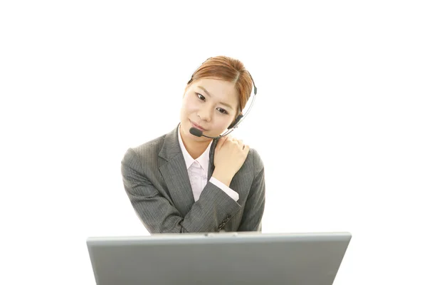 Smiling call center operator — Stock Photo, Image