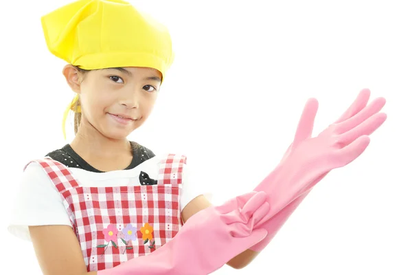 A girl wearing apron — Stock Photo, Image