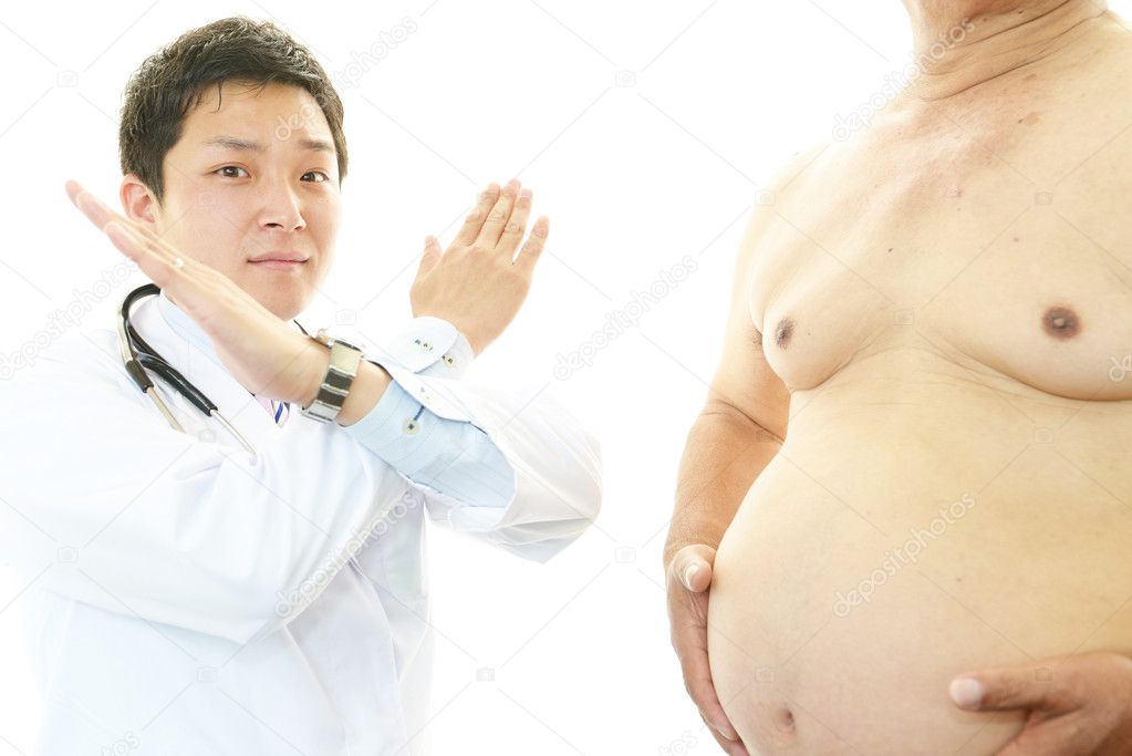Serious doctor examining a patient obesity