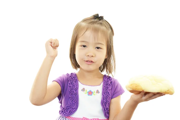 Holčička drží na chleba — Stock fotografie