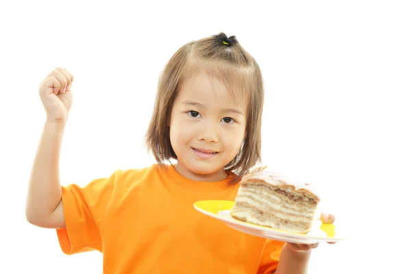 Liten flicka håller ett bröd — Stockfoto