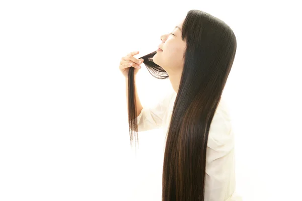 Jonge vrouw met mooie haren — Stockfoto