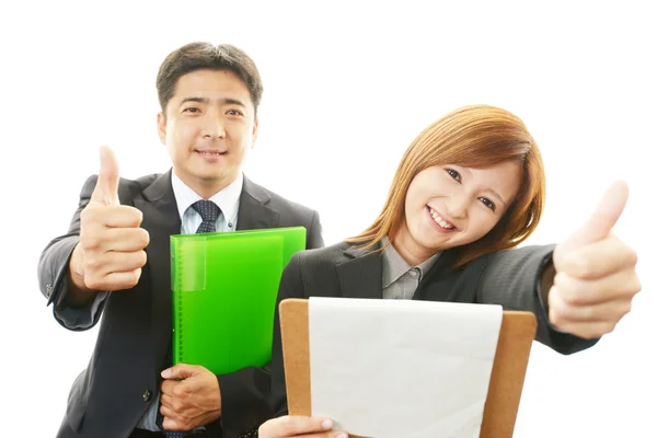 Hombre de negocios sonriente y mujer de negocios — Foto de Stock