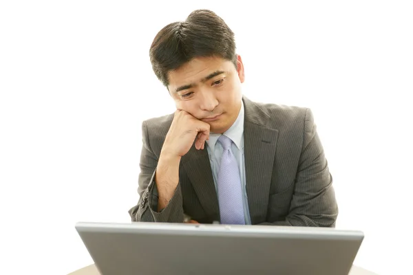 Depressed Asian businessman. — Stock Photo, Image