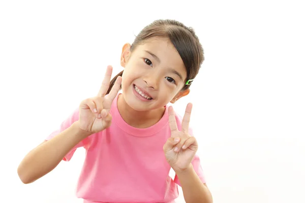 Menina asiática feliz sorriso em seu rosto — Fotografia de Stock