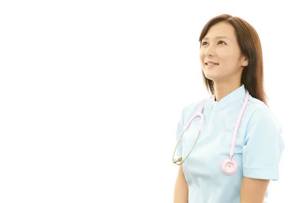 Porträtt av asiatiska kvinnlig sjuksköterska — Stockfoto