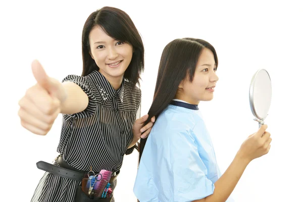 Smiling Asian hairdresser — Stock Photo, Image