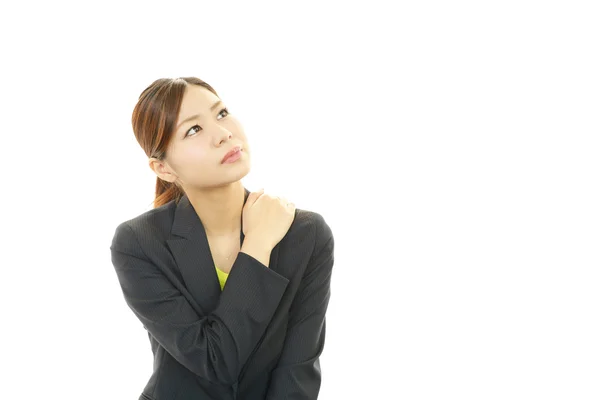 Business woman with shoulder pain. — Stock Photo, Image