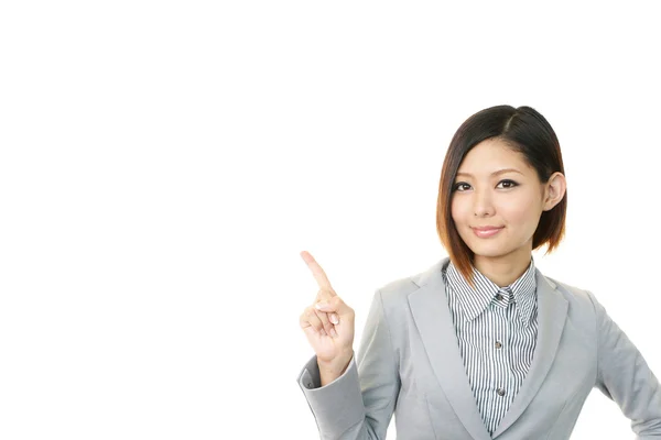 Young business woman pointing — Stock Photo, Image