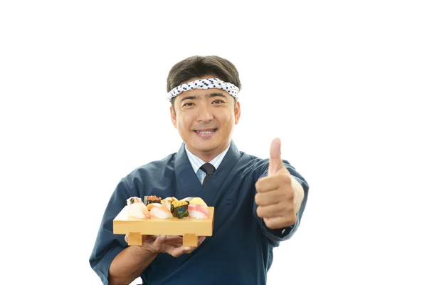 Porträt eines Sushi-Kochs — Stockfoto