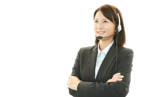 Smiling call center operator — Stock Photo, Image
