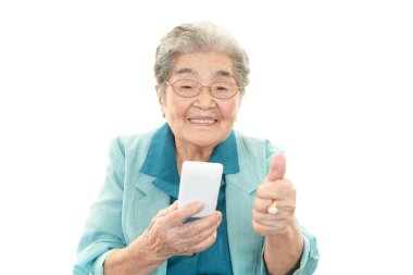 Old woman with mobile phone clipart