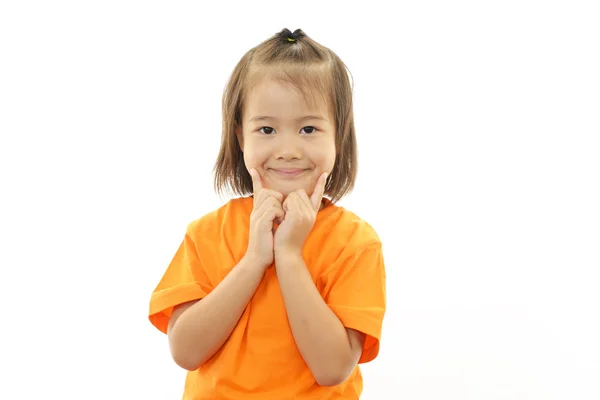 Roztomilá malá Asijská dívka s úsměvem — Stock fotografie