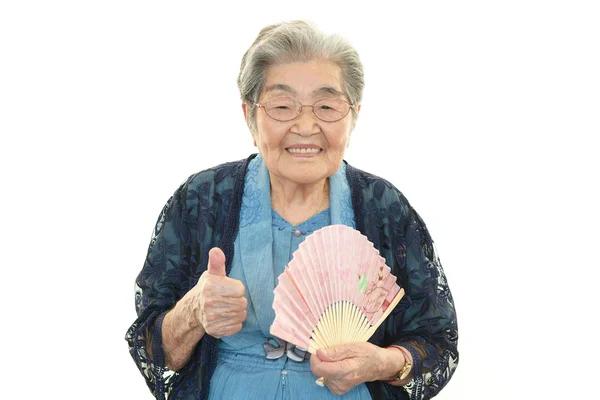 Smiling old woman — Stock Photo, Image