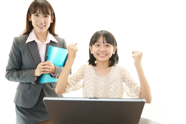 Profesora con chica estudiando . — Foto de Stock