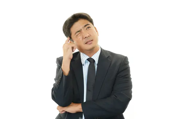 Depressed Asian businessman. — Stock Photo, Image