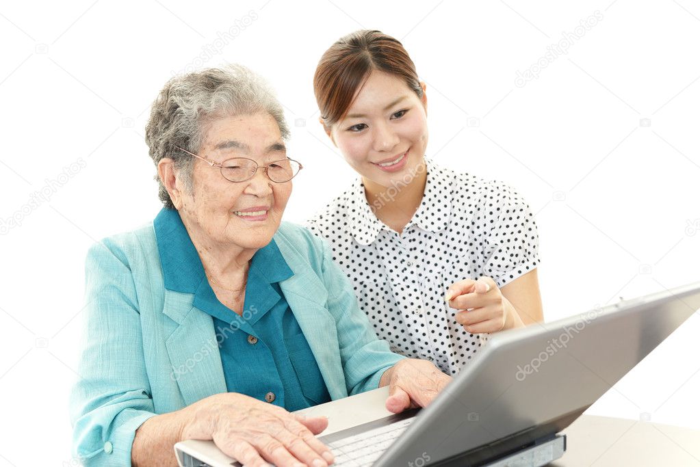 Senior lady enjoys computer