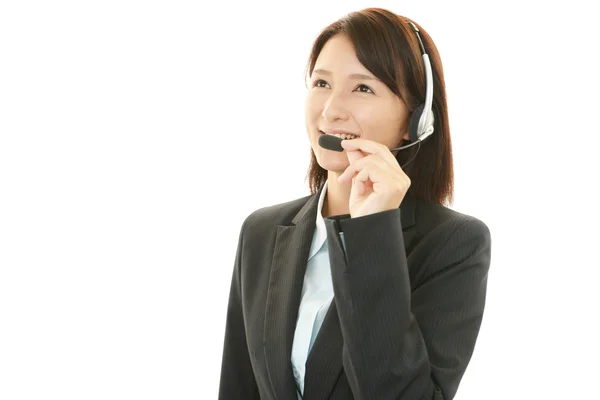 Smiling call center operator — Stock Photo, Image