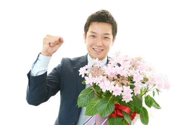 Man holding bouquet — Stock Photo, Image