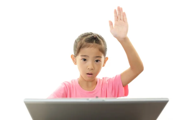 Girl using a laptop — Stock Photo, Image