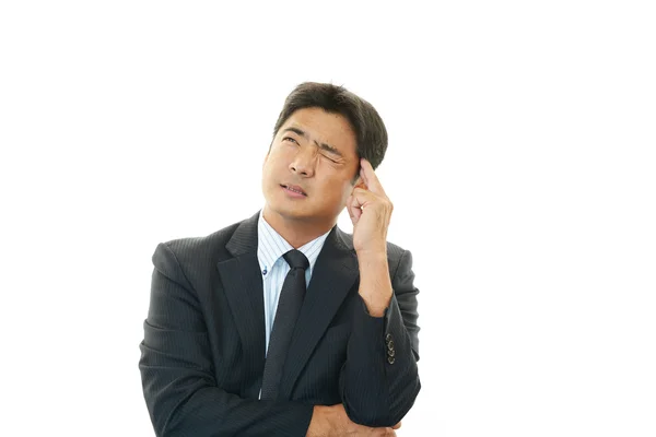 Businessman having a headache — Stock Photo, Image