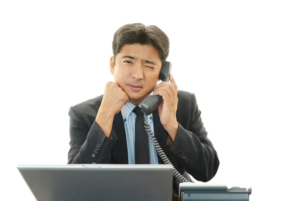 Gestresster asiatischer Geschäftsmann — Stockfoto