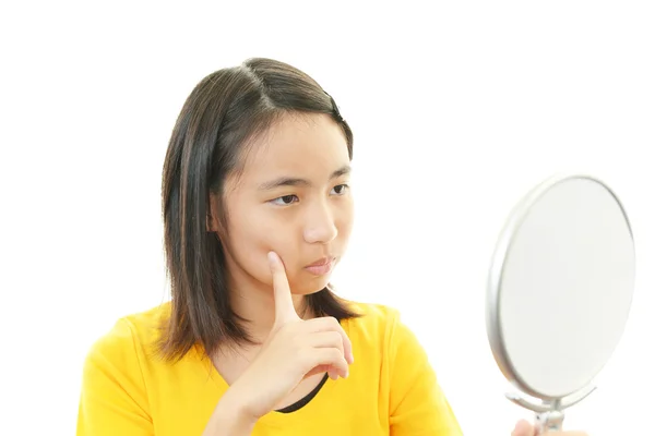 A teenage girl uneasy look — Stock Photo, Image