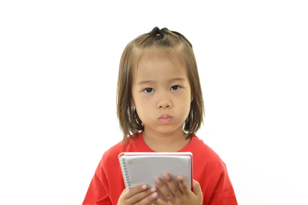 Little Asian girl uneasy look — Stock Photo, Image
