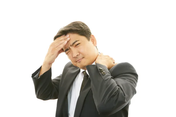 Businessman having a headache — Stock Photo, Image