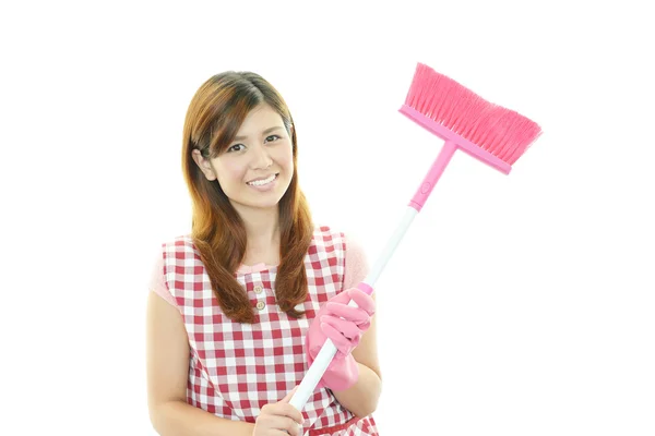 Vrouw met een reiniging — Stockfoto