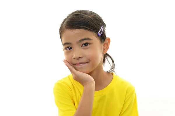 Menina asiática feliz sorriso em seu rosto — Fotografia de Stock