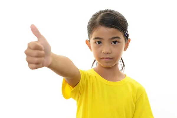 Happy girl showing thumbs up sign — Stock Photo, Image