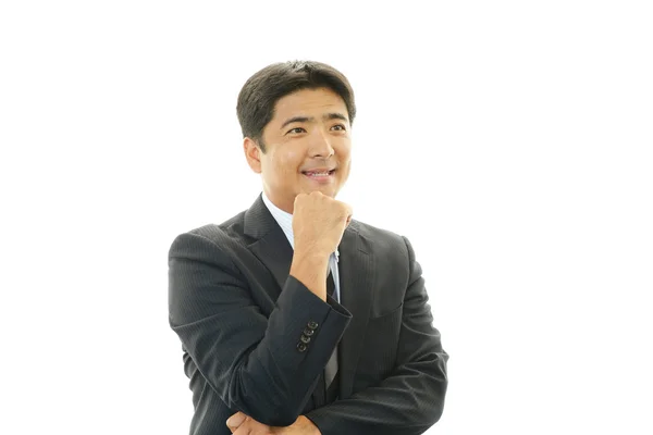 Smiling Asian businessman — Stock Photo, Image