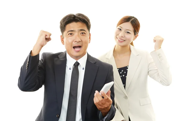 Hombre de negocios sonriente y mujer de negocios — Foto de Stock