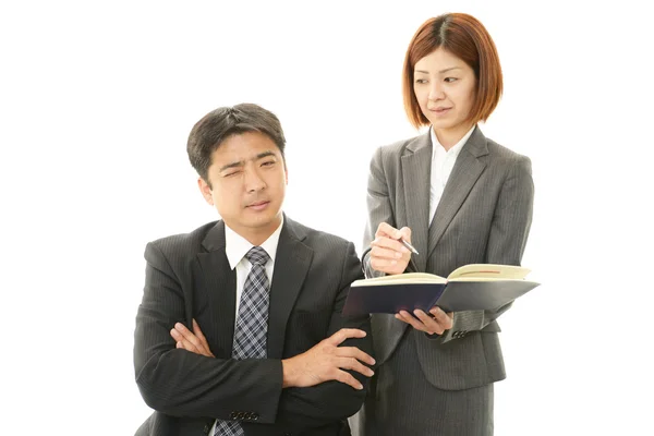 Uomo d'affari e donna d'affari discutono di piani — Foto Stock