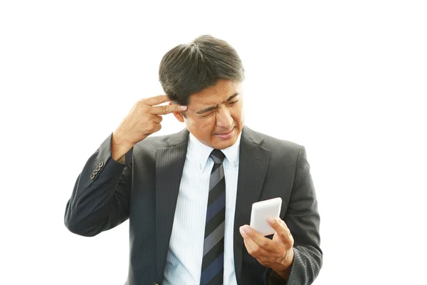 Depressiver asiatischer Geschäftsmann. — Stockfoto