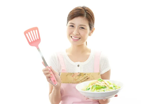 A woman wearing apron — Stock Photo, Image