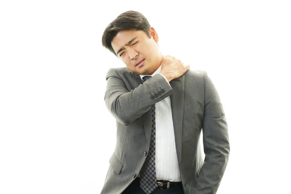 Businessman with shoulder pain. — Stock Photo, Image