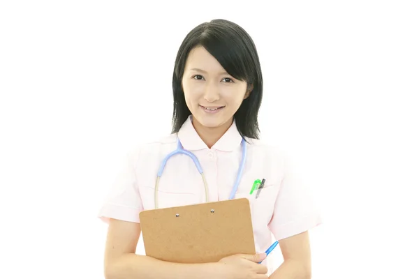 Lächelnd asiatische Krankenschwester — Stockfoto