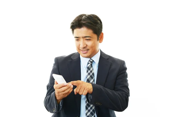 Smiling Asian businessman — Stock Photo, Image