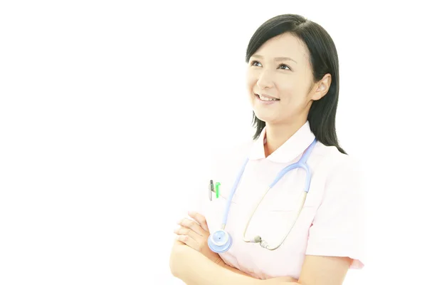 Lächelnd asiatische Krankenschwester — Stockfoto