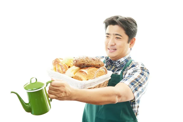Smiling Asian waiter — Stock Photo, Image