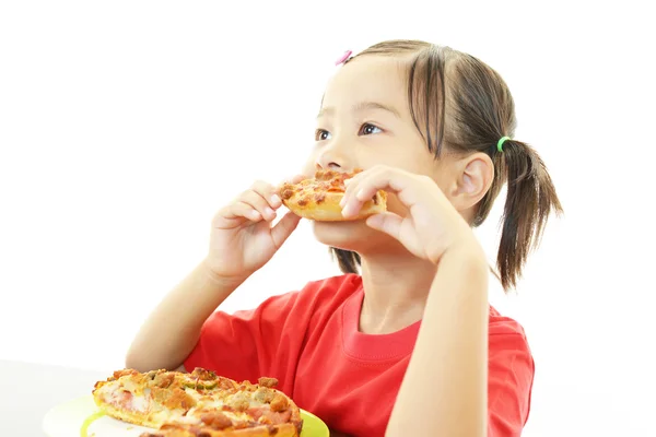 Little girl eating food — Stock Photo, Image