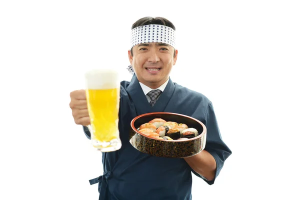 Porträtt av en sushikock — Stockfoto