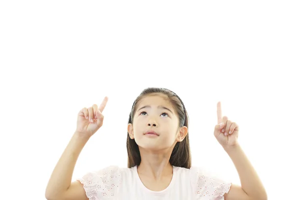 Menina asiática apontando — Fotografia de Stock