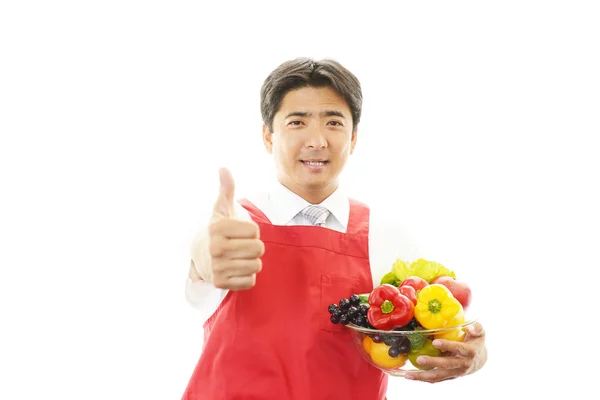 Smiling Asian waiter — Stock Photo, Image