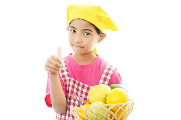 Smiling girl with fruits — Stock Photo, Image