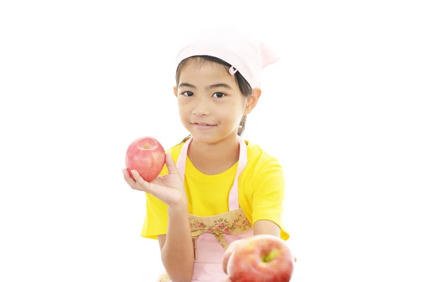 Chica sonriente con frutas — Foto de Stock